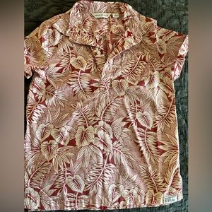 Child’s Hawaiian shirt. Size 6 in child size. Like New. Half button-down.